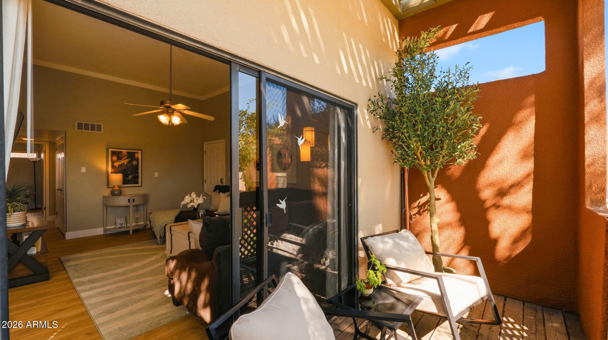 Private covered balcony overlooking the community grounds